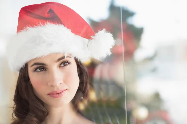 Portret van een feestelijke brunette denken — Stockfoto