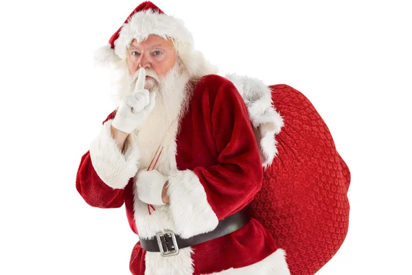 Santa pidiendo silencio con bolsa — Foto de Stock