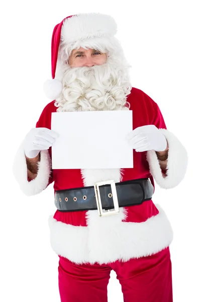 Smiling Santa Claus holding page — стоковое фото