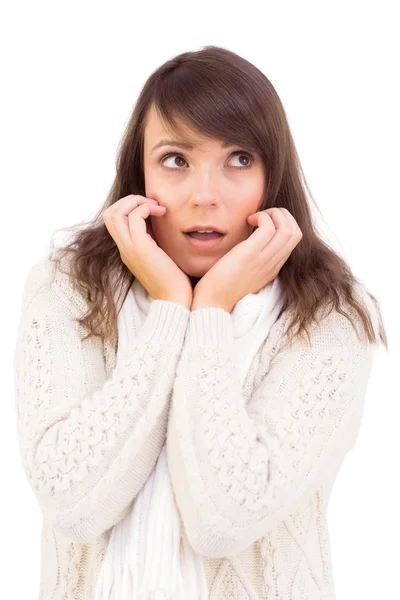 Cute brunette looking surprised with hands on face — Stock Photo, Image