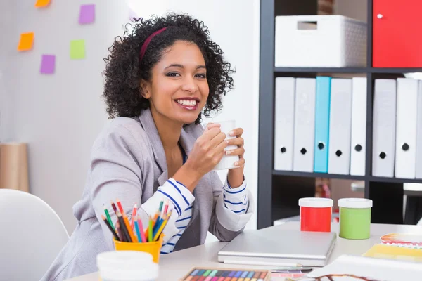 Female interior designer with coffee cup — Stock Photo, Image