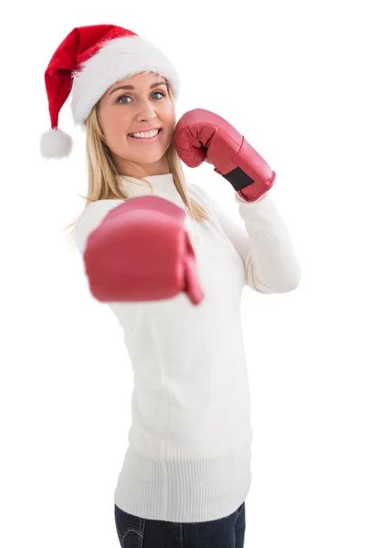 Festive blonde in boxing gloves — Stock Photo, Image