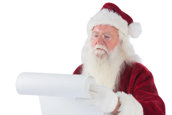 Santa Claus reads a list — Stock Photo, Image