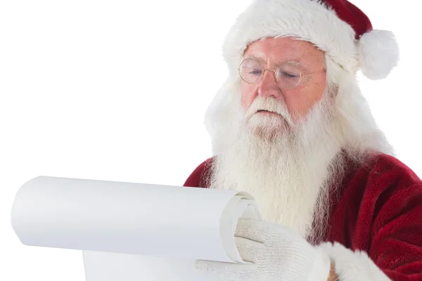 Santa Claus läser en lista — Stockfoto