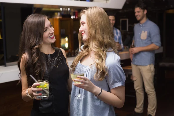 Pretty friends having a drink together — Stock Photo, Image