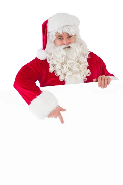 Happy santa claus presenting sign — Stock Photo, Image