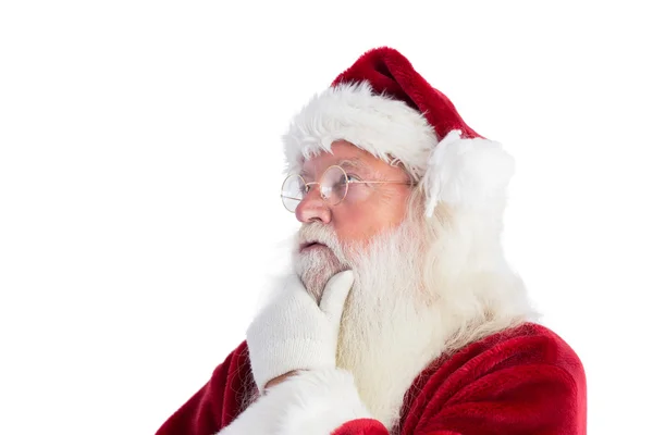 Santa is het denken over iets — Stockfoto