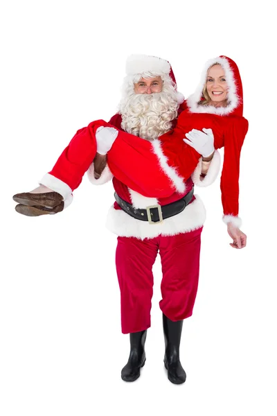 Santa Claus y la señora sonriendo a la cámara — Foto de Stock