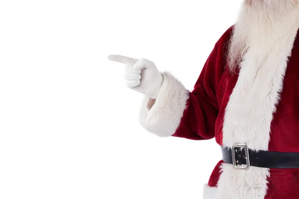 Santa Claus señala algo —  Fotos de Stock