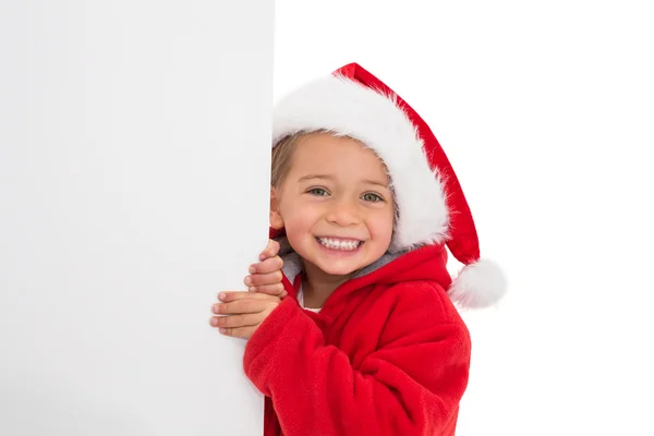 Petite fille festive montrant affiche — Photo