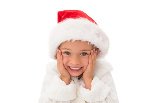 Petite fille mignonne portant un chapeau de Père Noël — Photo