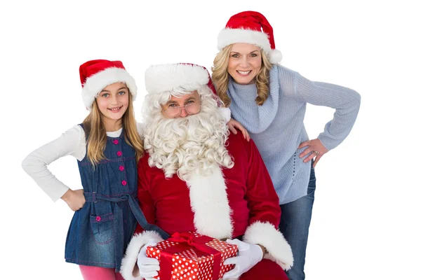 Moeder en dochter met santa claus — Stockfoto