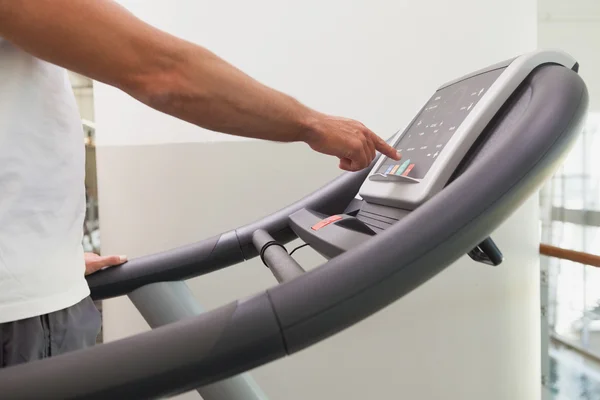 Fit man working out on treadmill — Stock Photo, Image