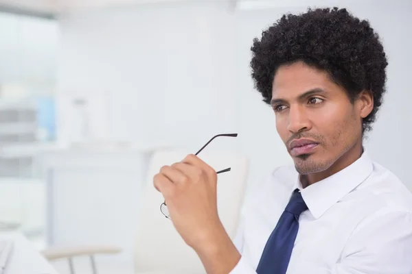 Handsome photo editor working at desk — Stock Photo, Image