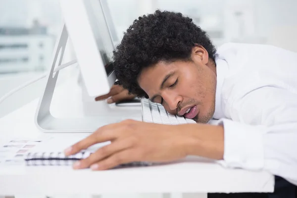 Handsome photo editor sleeping at desk — Stock Photo, Image