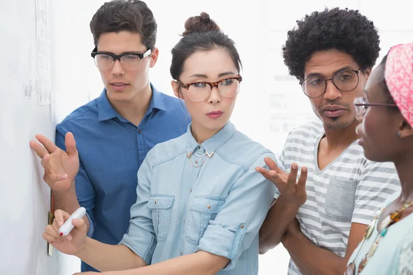 Young creative team brainstorming together — Stock Photo, Image