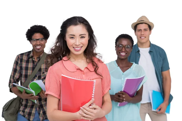 Stijlvolle studenten samen op de camera glimlachen — Stockfoto