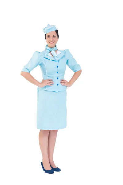 Hübsche Stewardess lächelt in die Kamera — Stockfoto