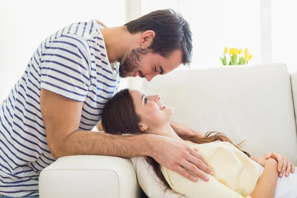 Cute couple relaxing on couch — Stock Photo, Image