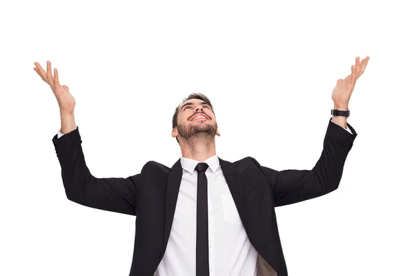 Businessman cheering with hands raised — Stock Photo, Image