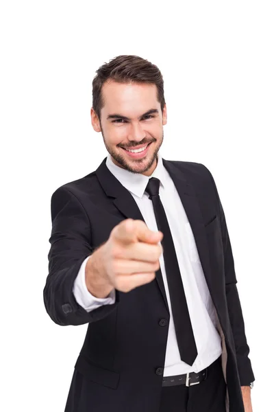 Happy businessman pointing at camera — Stock Photo, Image