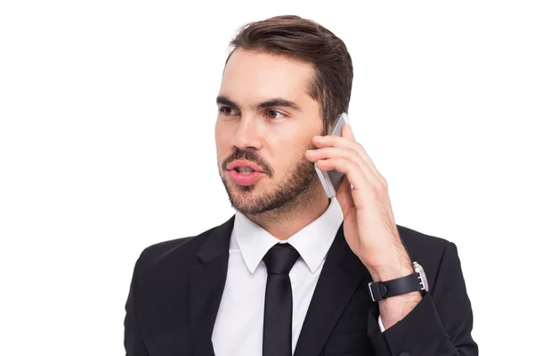 Умный бизнесмен говорит по телефону — стоковое фото