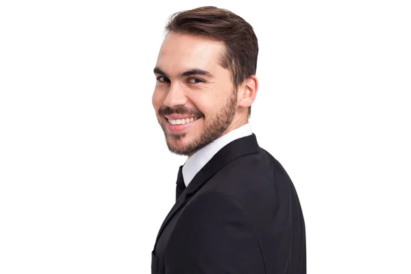 Eleganter Geschäftsmann im Anzug lächelt in die Kamera — Stockfoto