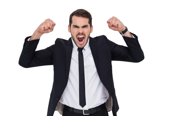 Furious businessman tensing arms muscle — Stock Photo, Image