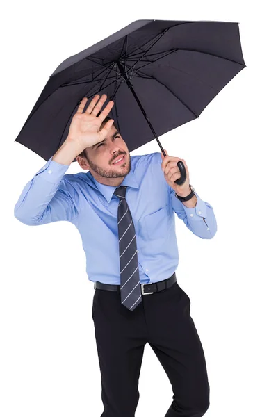 Verblind zakenman bescherming van zijn ogen met zijn hand — Stockfoto