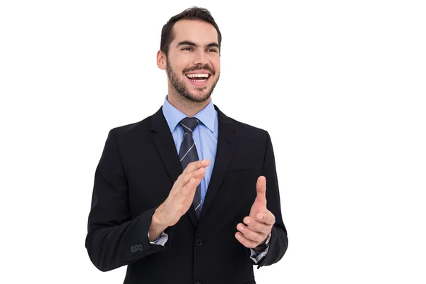 Happy affärsman står och klappar — Stockfoto