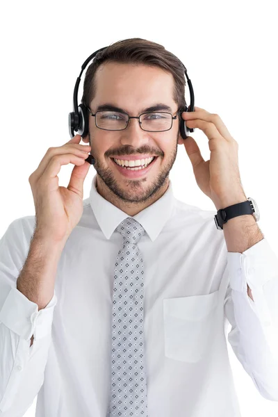 Portrét usměvavý obchodník s sluchátka — Stock fotografie