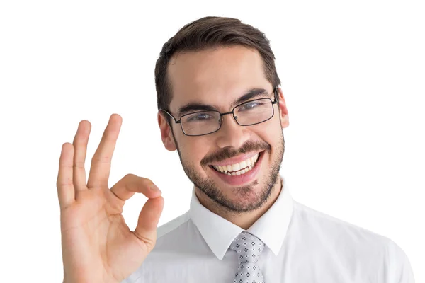 Happy businessman making okay gesture — Stock Photo, Image