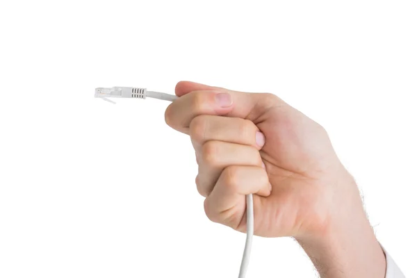 Mano de hombre de negocios sosteniendo cable blanco — Foto de Stock