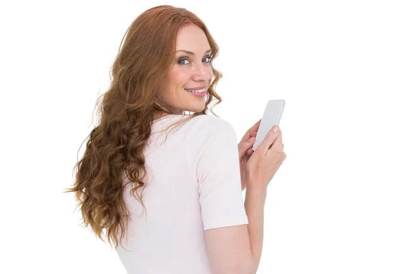 Pretty redhead sending text message — Stock Photo, Image