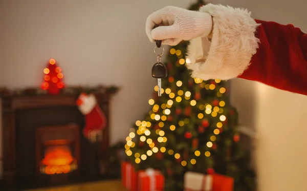 Hand of santa holding car key — Stock Photo, Image