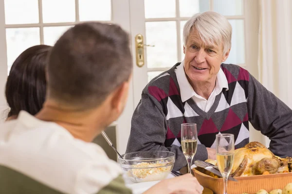 Portrait of grandfather during christmas dinner — Stock Photo, Image