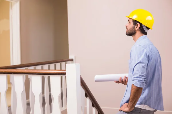 Casual architect walking up the stairs — Stock Photo, Image