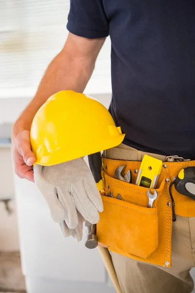 Close up of man with tool belt — Stock Photo, Image
