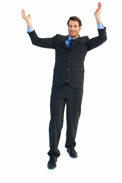 Бизнесмен аплодирует с поднятыми руками — стоковое фото