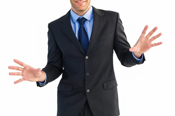 Businessman standing with fingers spread out — Stock Photo, Image