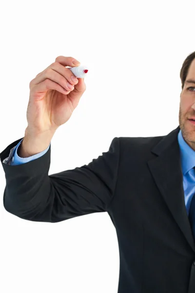 Businessman writing with red marker — Stock Photo, Image