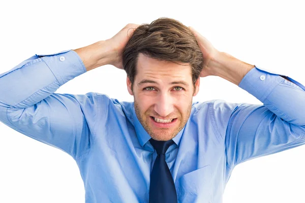 Stressed businessman with hands on head — Stock Photo, Image