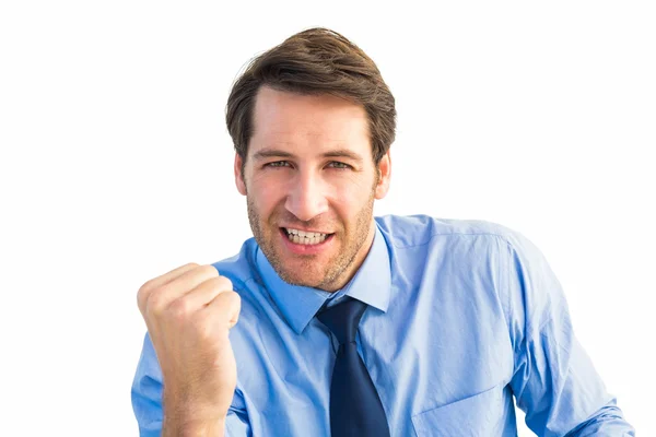 Cheerful businessman clenching fist looking at camera — Stock Photo, Image