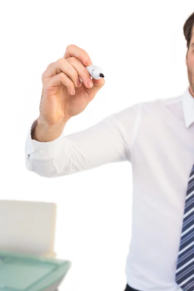 Businessman writing with black marker — Stock Photo, Image