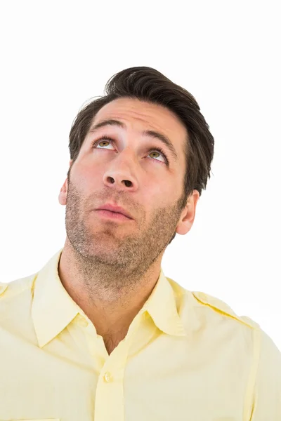 Hombre guapo con camisa mirando hacia arriba — Foto de Stock