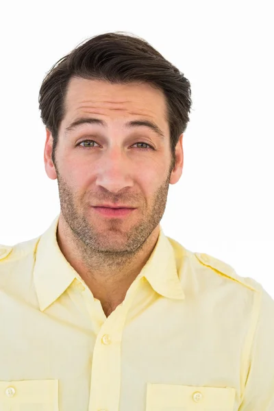 Surprised handsome man looking at camera — Stock Photo, Image