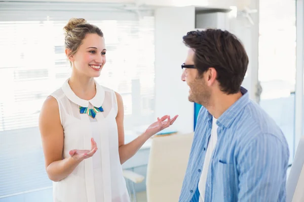 Two photo editors speaking together — Stock Photo, Image