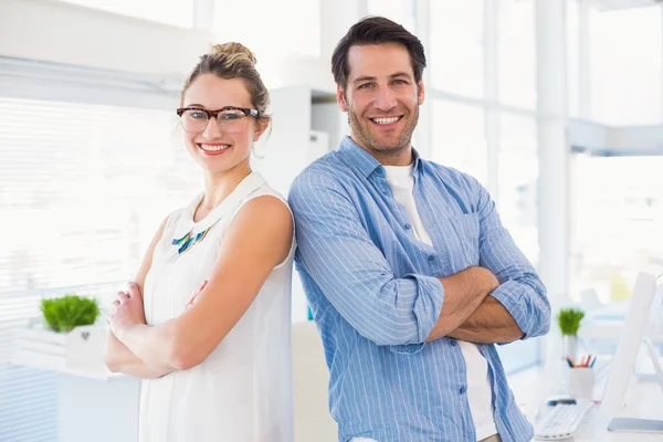 Cheerful photo editor posing with arms crossed — Stock Photo, Image