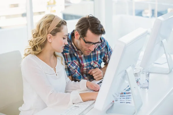 Photo editors working on contact sheet — Stock Photo, Image