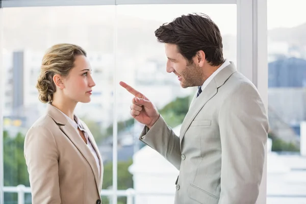 Angry man pointing at his colleague — Stock Photo, Image